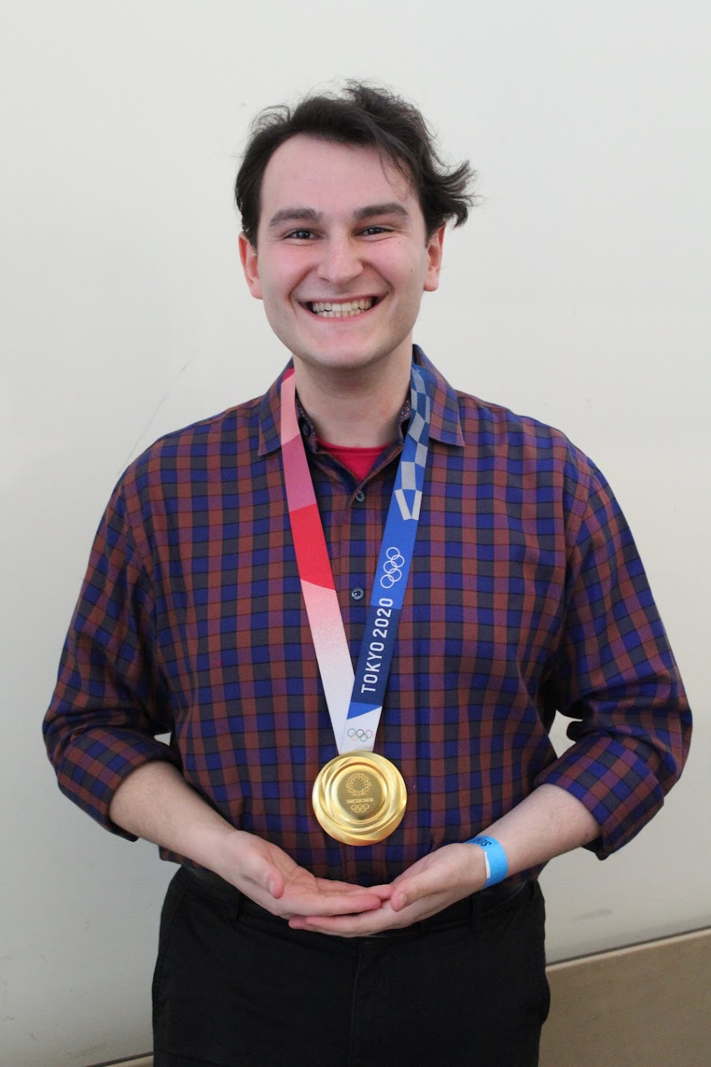 A picture of me wearing a Tokyo 2020 Olympic Gold medal